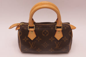 Louis Vuitton MINI Speedy HL Monogram