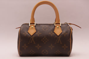 Louis Vuitton MINI Speedy HL Monogram