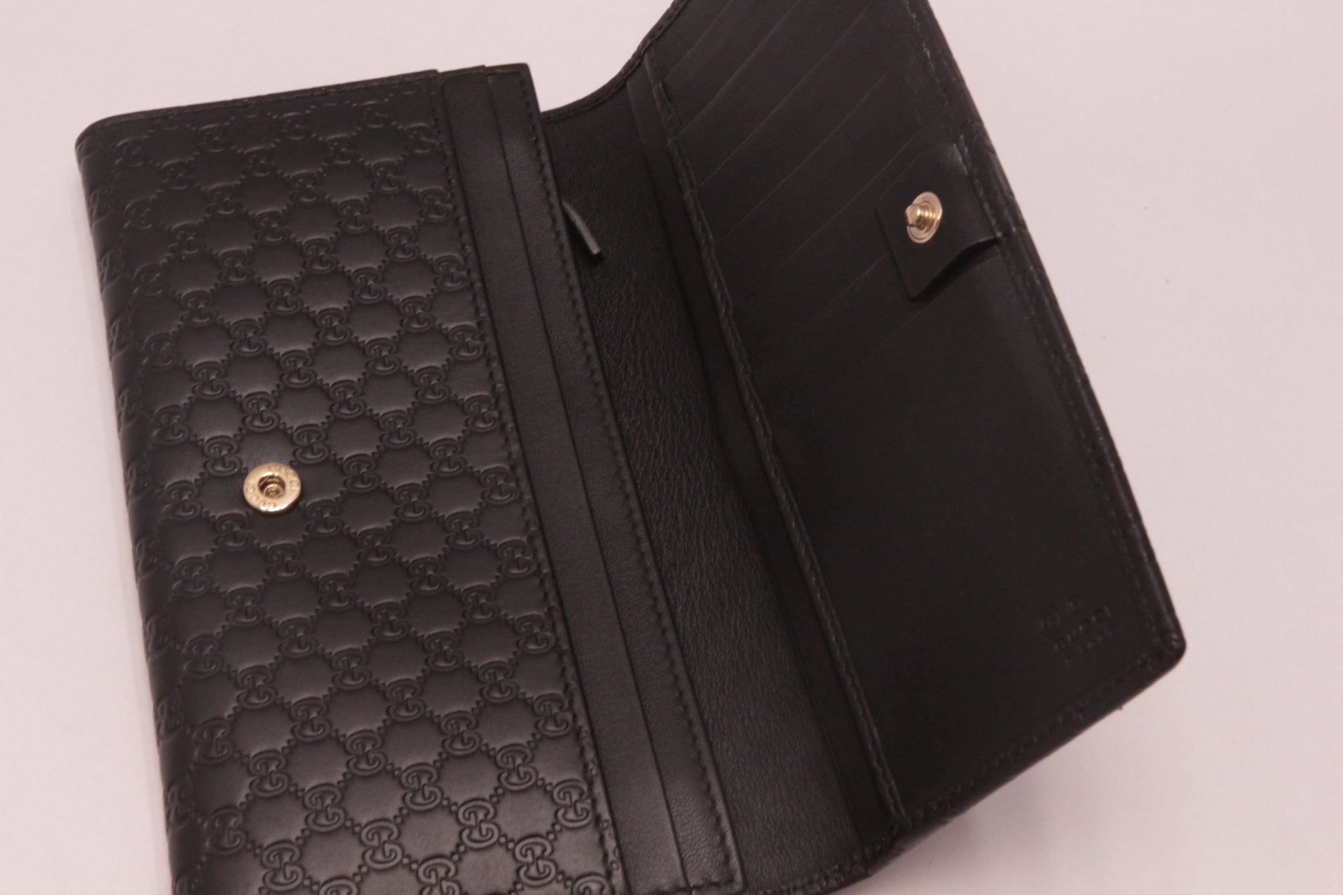 Gucci Micro Guccissima Leder Geldbörse